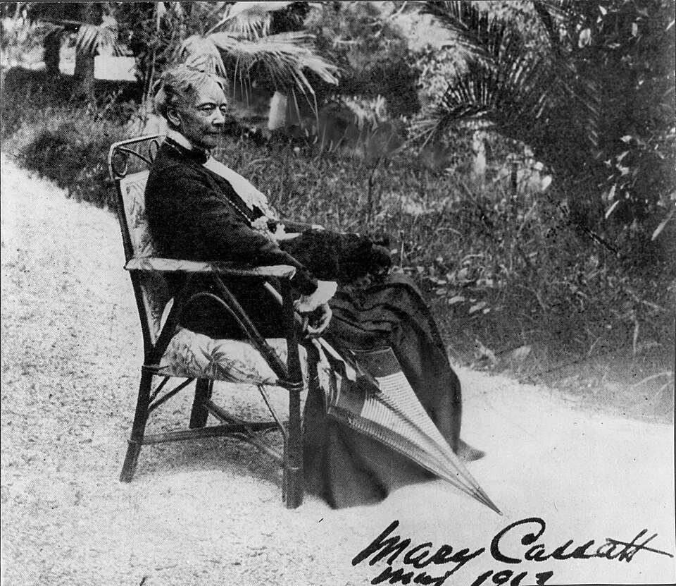 Portrait photograph of Mary Cassatt seated outdoors in 1913