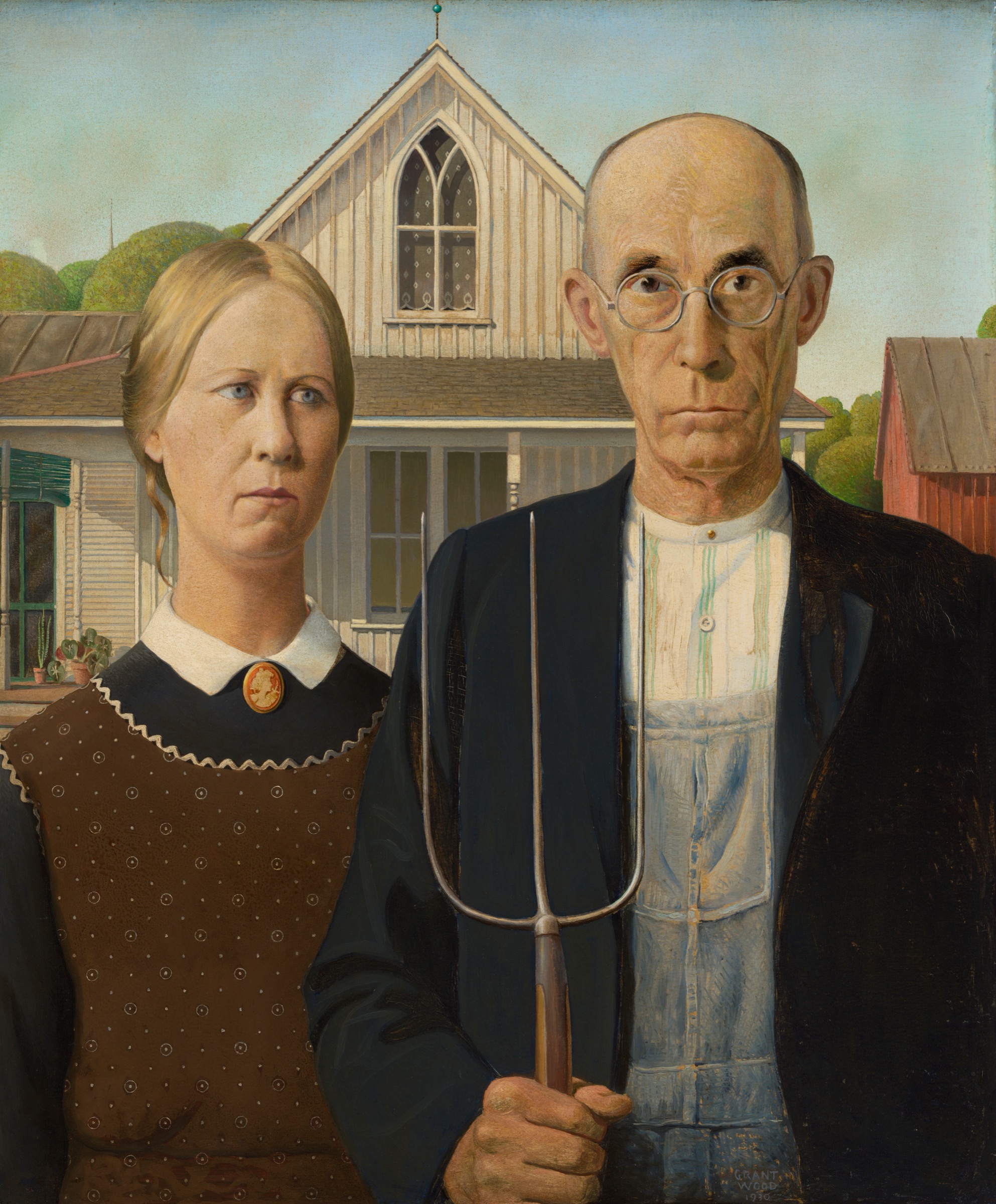 Grant Wood’s American Gothic, showing a farmer holding a pitchfork beside his daughter in front of an Iowa house.
