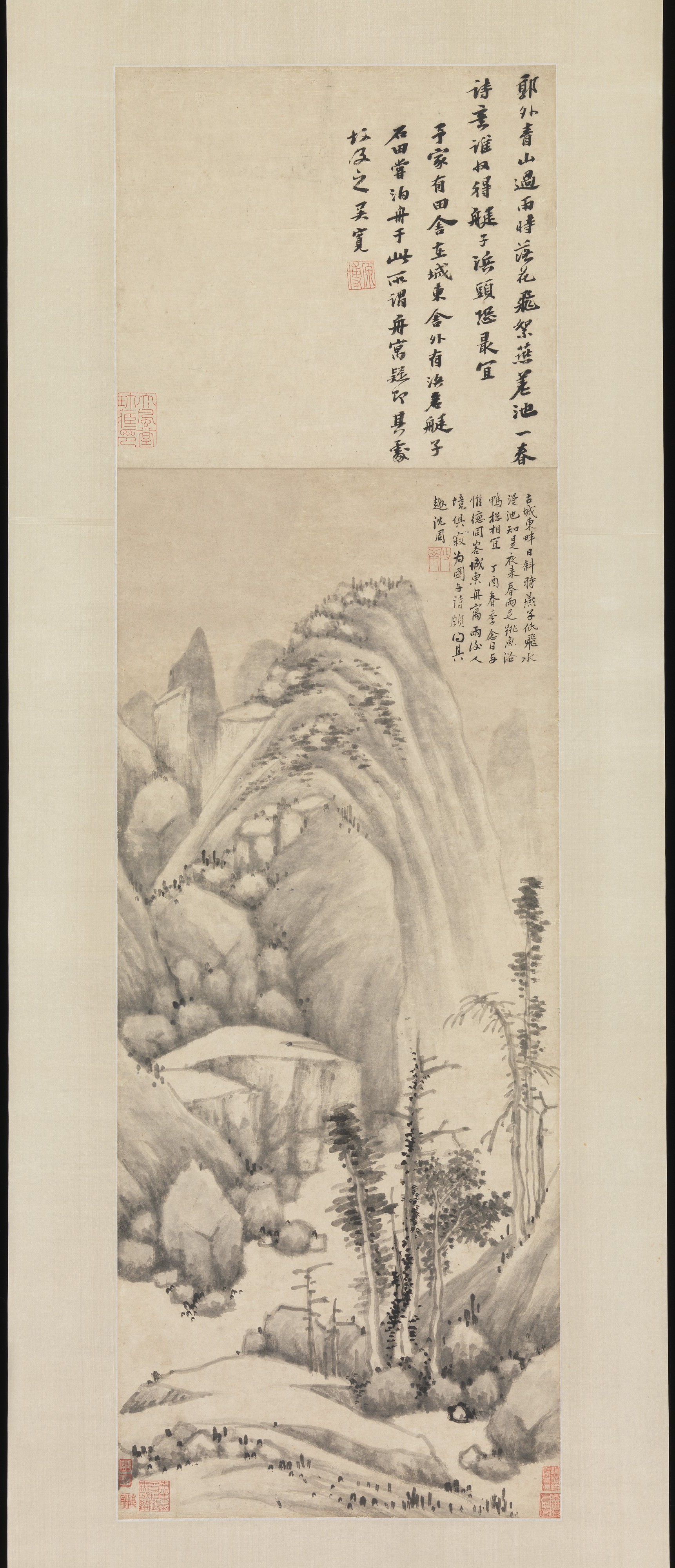 Shen Zhou’s narrow ink hanging scroll with a moored boat, dark trees, pale water, soft mountains, mist, and calligraphy above.